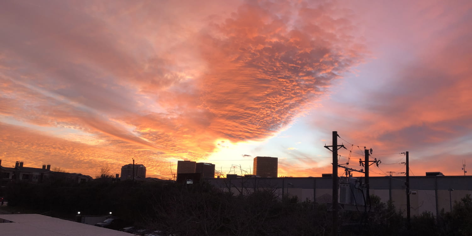 Clouds with reds blues and some light oranges