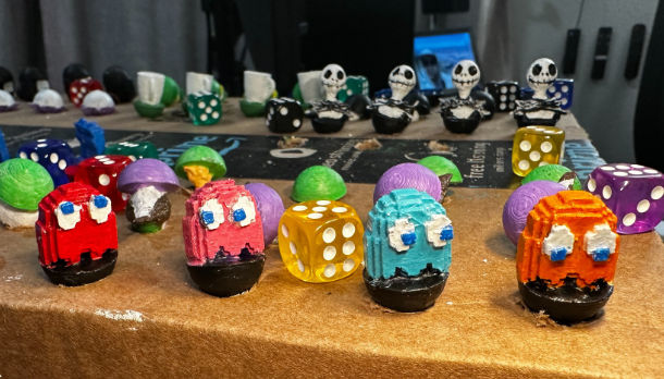 72 hand-painted custom marbles organized in 18 themed sets