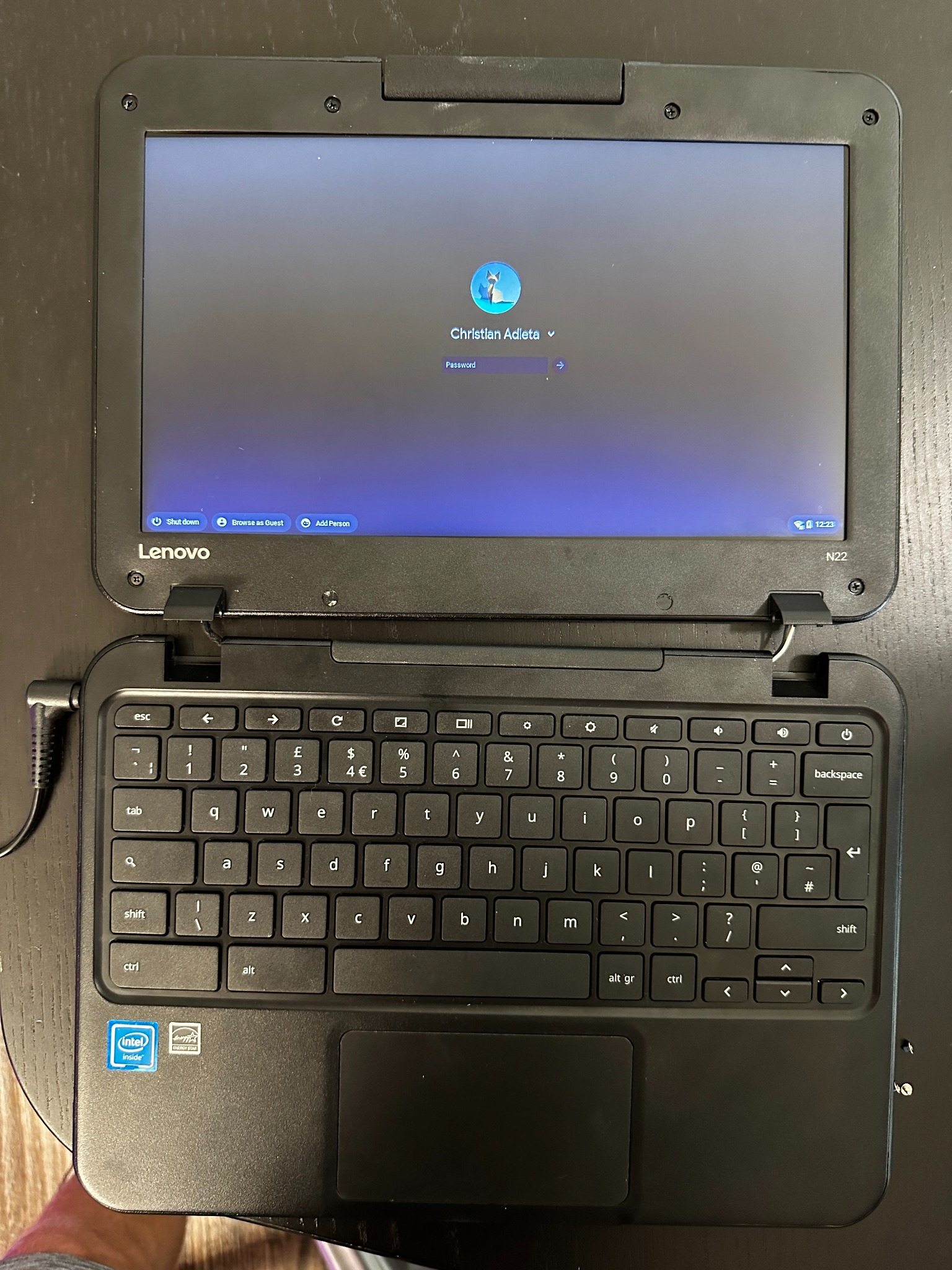 Chromebook fully reassembled and showing login screen