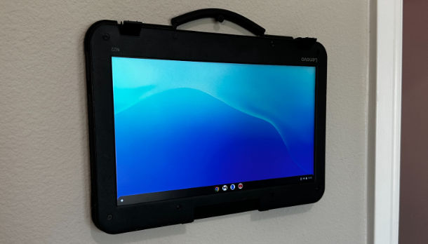 Chromebook mounted on wall as digital display