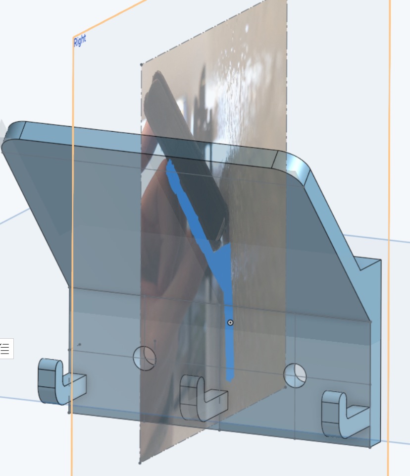 CAD software showing transparent reference photo aligned with 3D model for angle matching