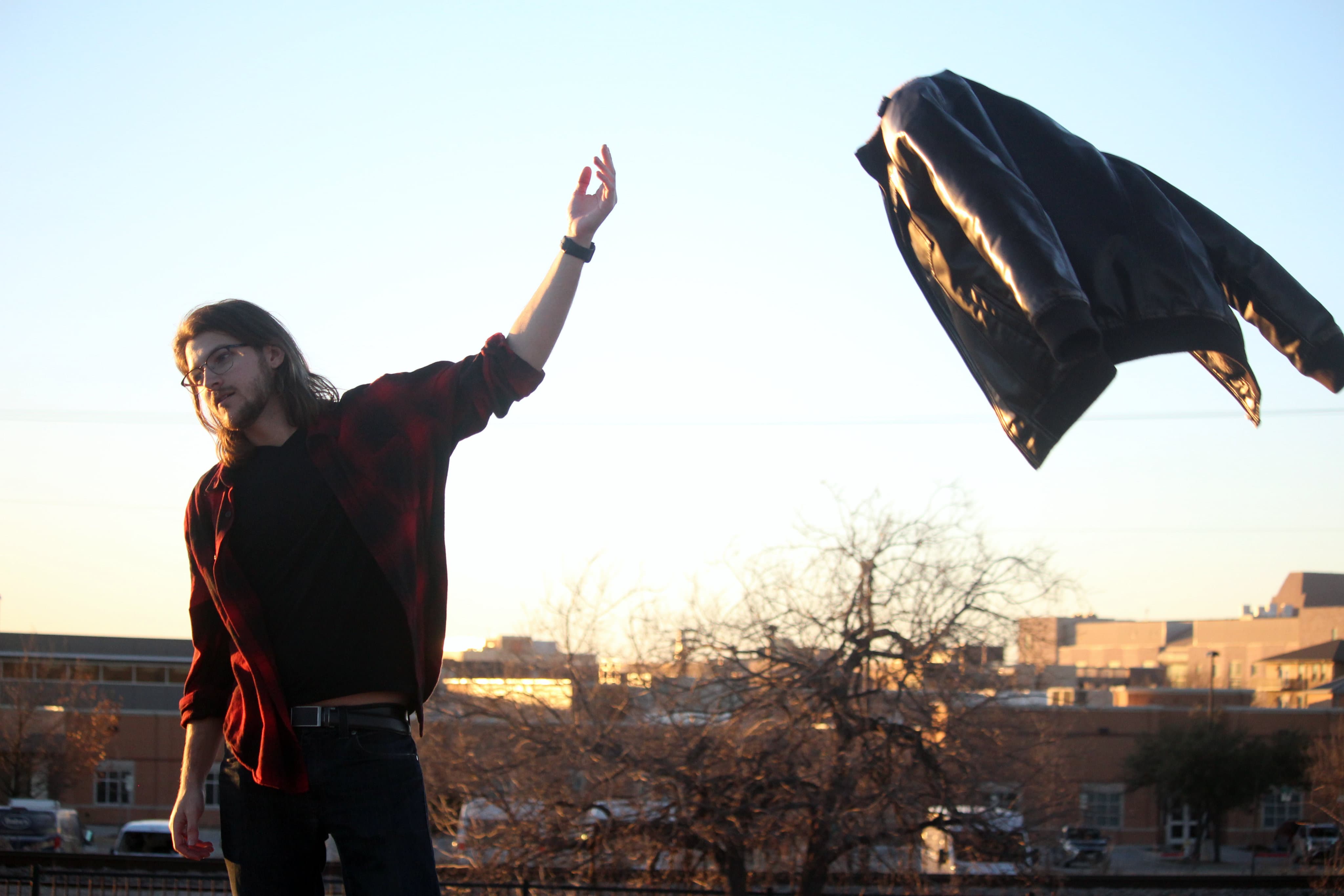 Photo of throwing a jacket in the air